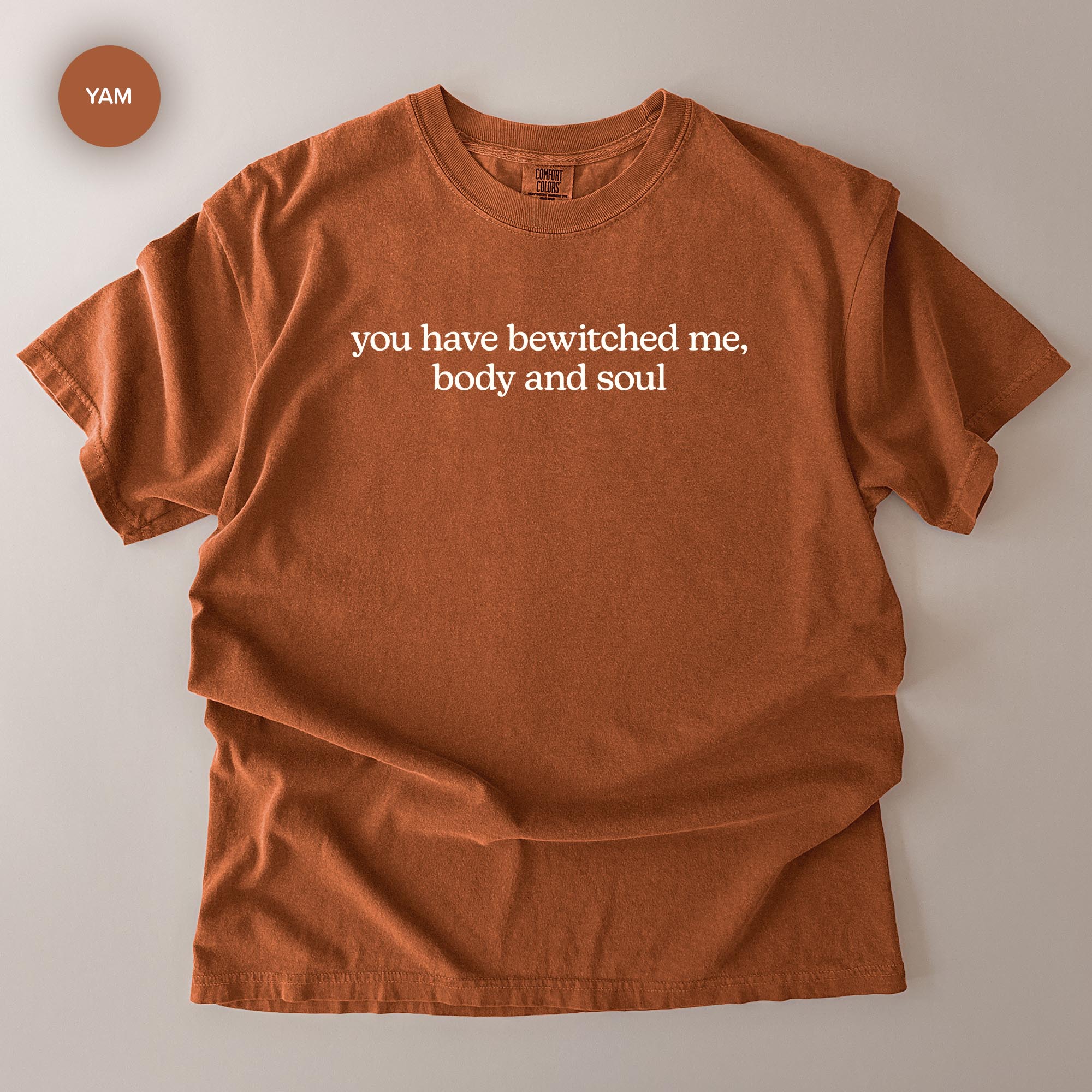 a red t-shirt with the text "you havewitched me, body and soul" printed on it.