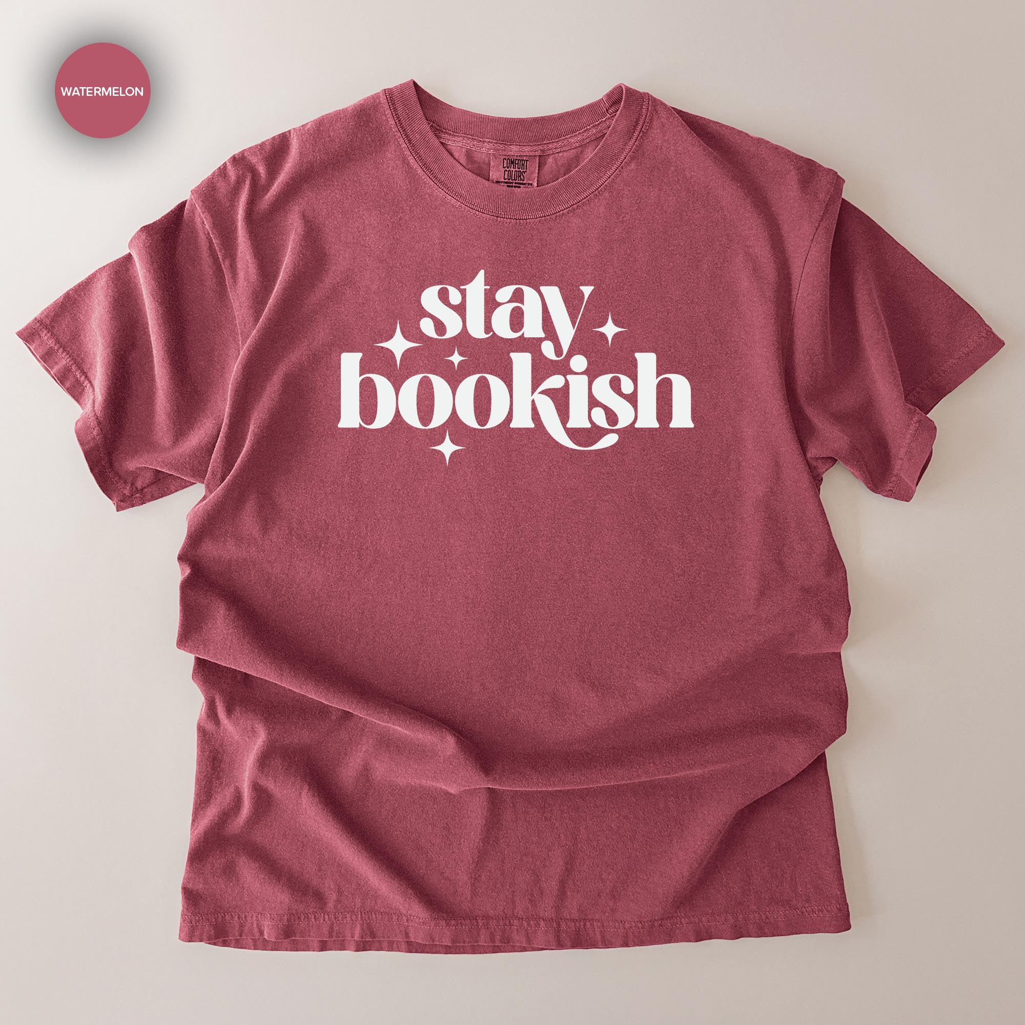 A red t-shirt with the text "stay bookish" printed on it.
