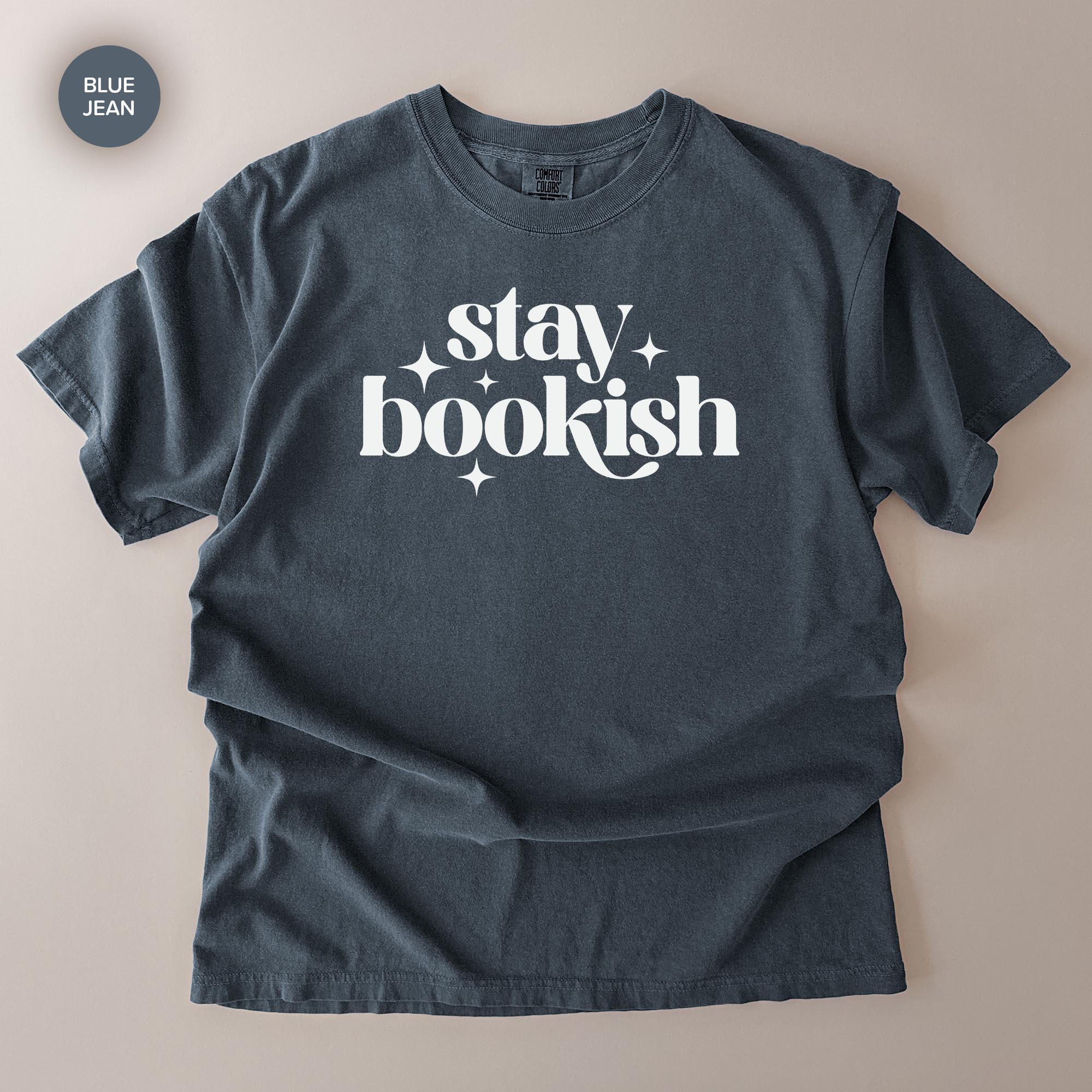 A gray t-shirt with the text "stay bookish" printed on it.
