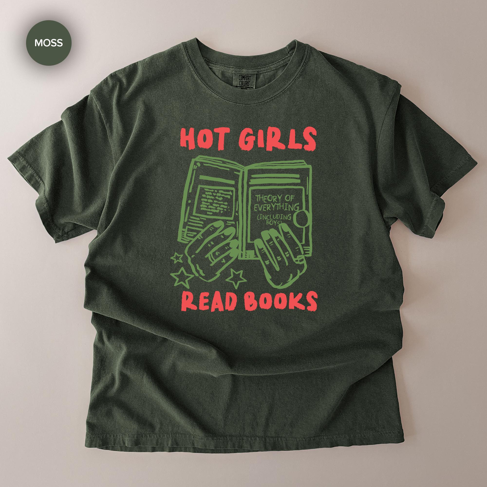 A green t-shirt with a graphic design that says "HOT GIRLS READ BOOKS" and features a hand holding a book.