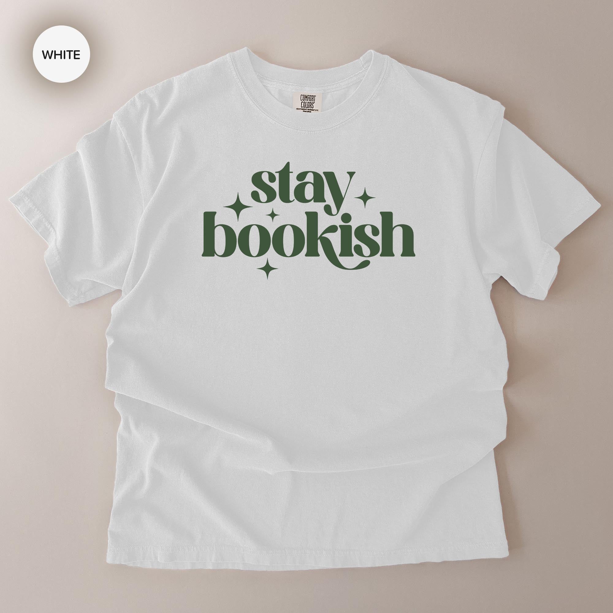 A white t-shirt with the text "stay bookish" printed on it in a stylized font.