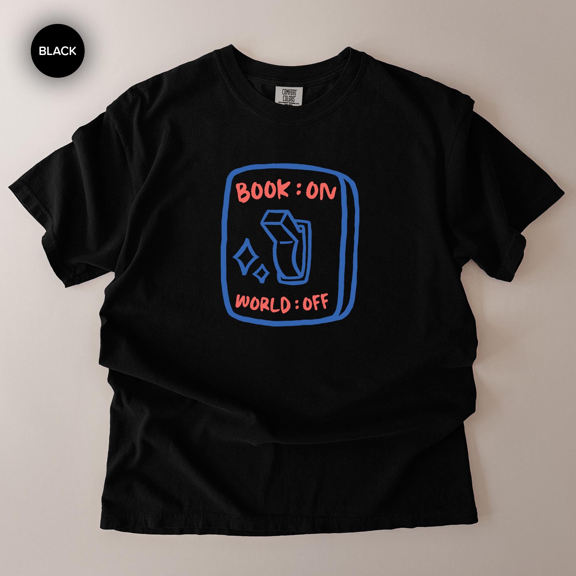 A black t-shirt with a graphic design on it.