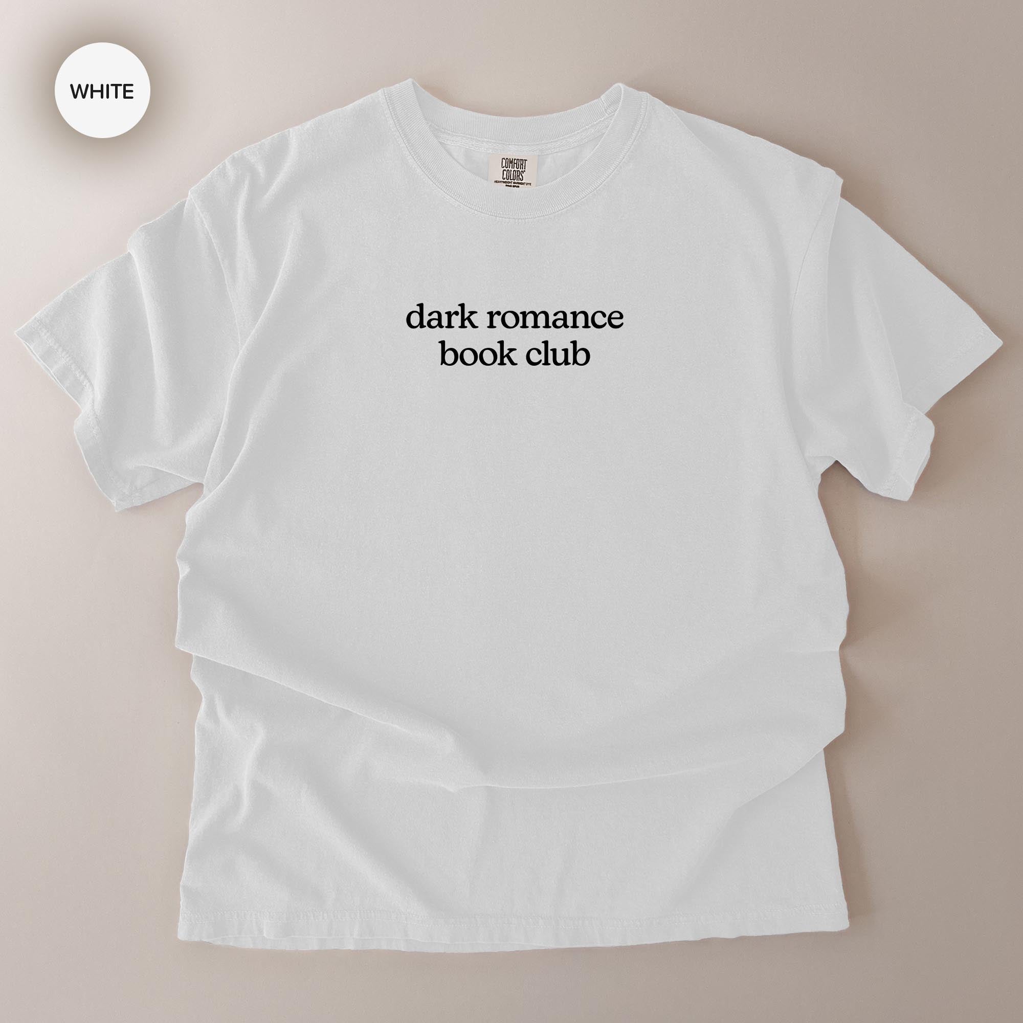 A white t-shirt with the text "dark romance book club" printed on it.